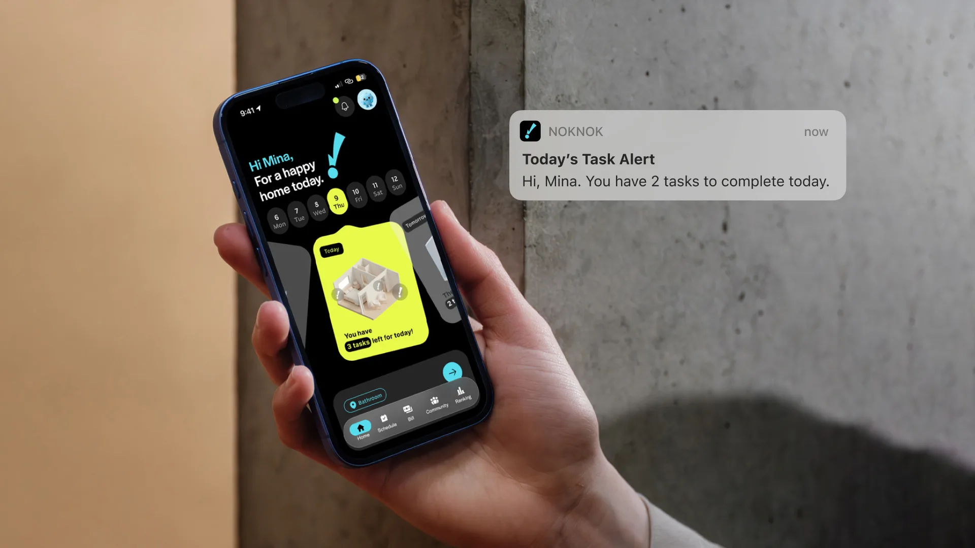 A hand holds a smartphone displaying the Noknok app home screen, with an on-screen notification reading “Today’s Task Alert” indicating that two tasks remain.